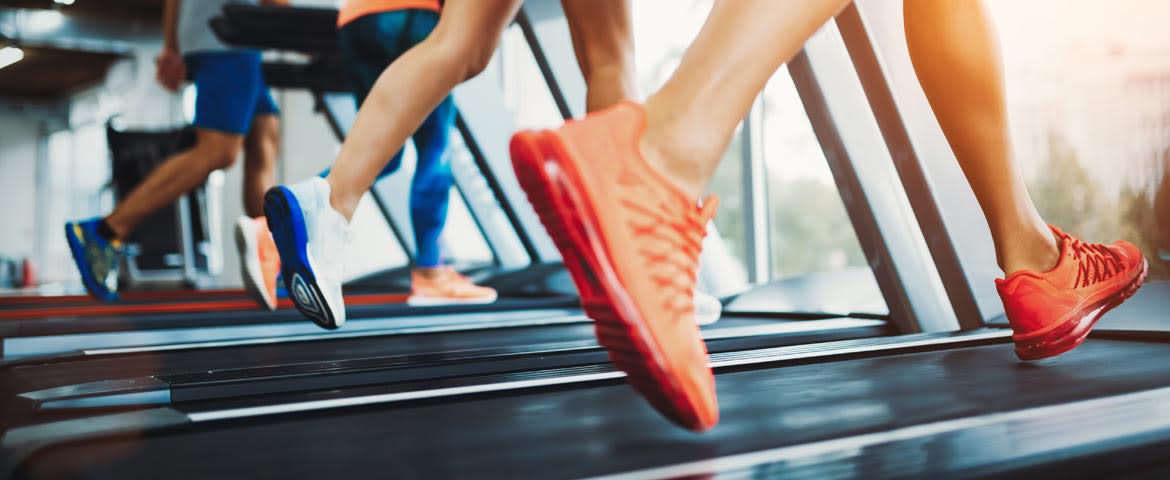 photo of feet on treadmills