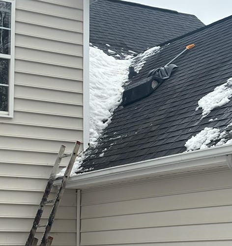 Snow and ice removal from roof and gutters