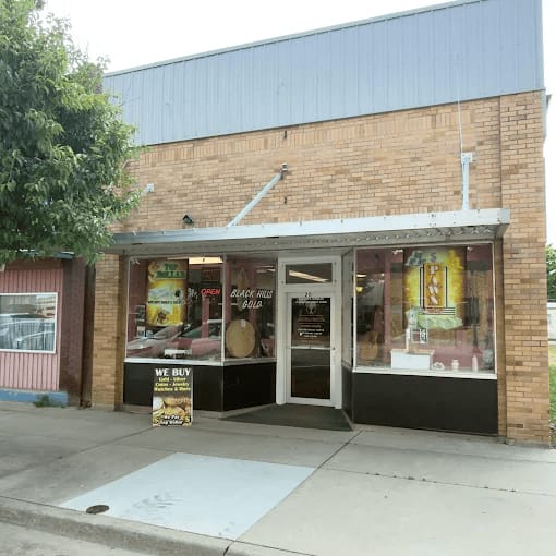 Brick storefront of Larsen's Jewelry & Half Interest Pawn on N Main Street in Mobridge, South Dakota.