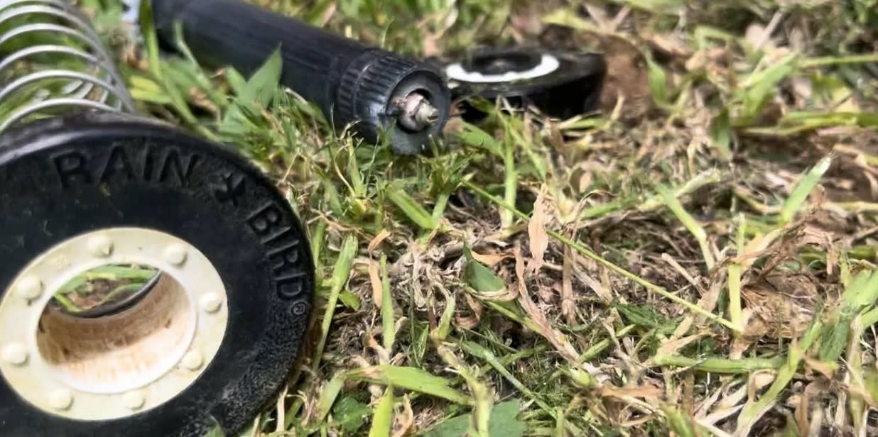 Broken Rainbird sprinkler head replaced with new irrigation unit in Cushing, OK by Cardinal Outdoor Services