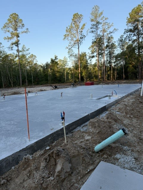 Concrete slab foundation for a new custom home under construction in Flagler Estates, St. Johns County, Florida by JBH Custom