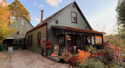 Moonrise on Mill Street Inn- A-frame lodging with front balcony and mood lighting