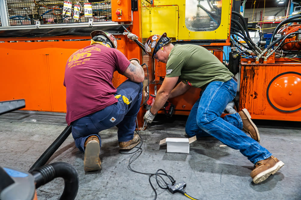 JDI Piping and Millwright team installing machinery