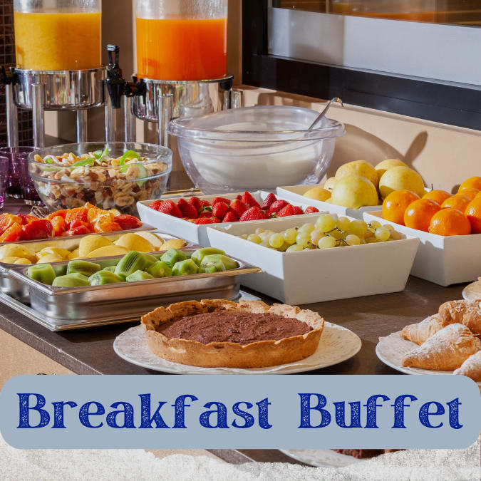 photo of a buffet with fruit and juice with text "breakfast buffet"