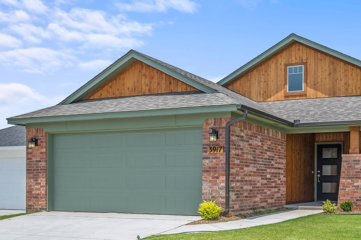 Garage door painting in Burleson TX by AK Painting Services