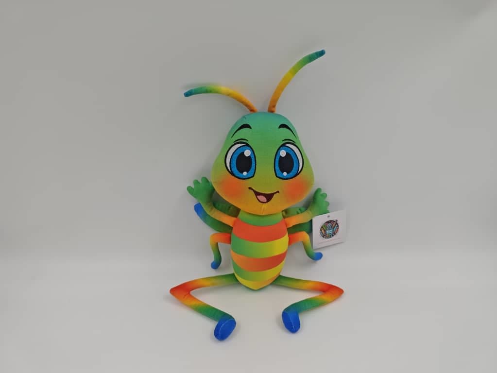 Eric the Colorful Cricket character plush toy inspired by Tammy Christian's children's books.