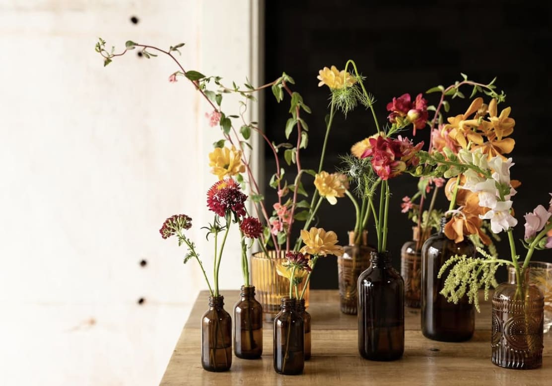 Bud vase floral arrangements.
