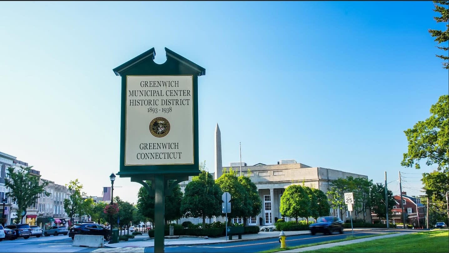 Welcome sign for Greenwich, Connecticut, highlighting the town where Worth Avenue Capital’s bridge loan transaction successfu