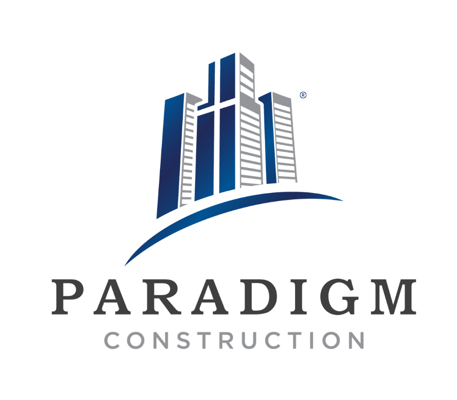 Paradigm Construction logo with tagline on company signage