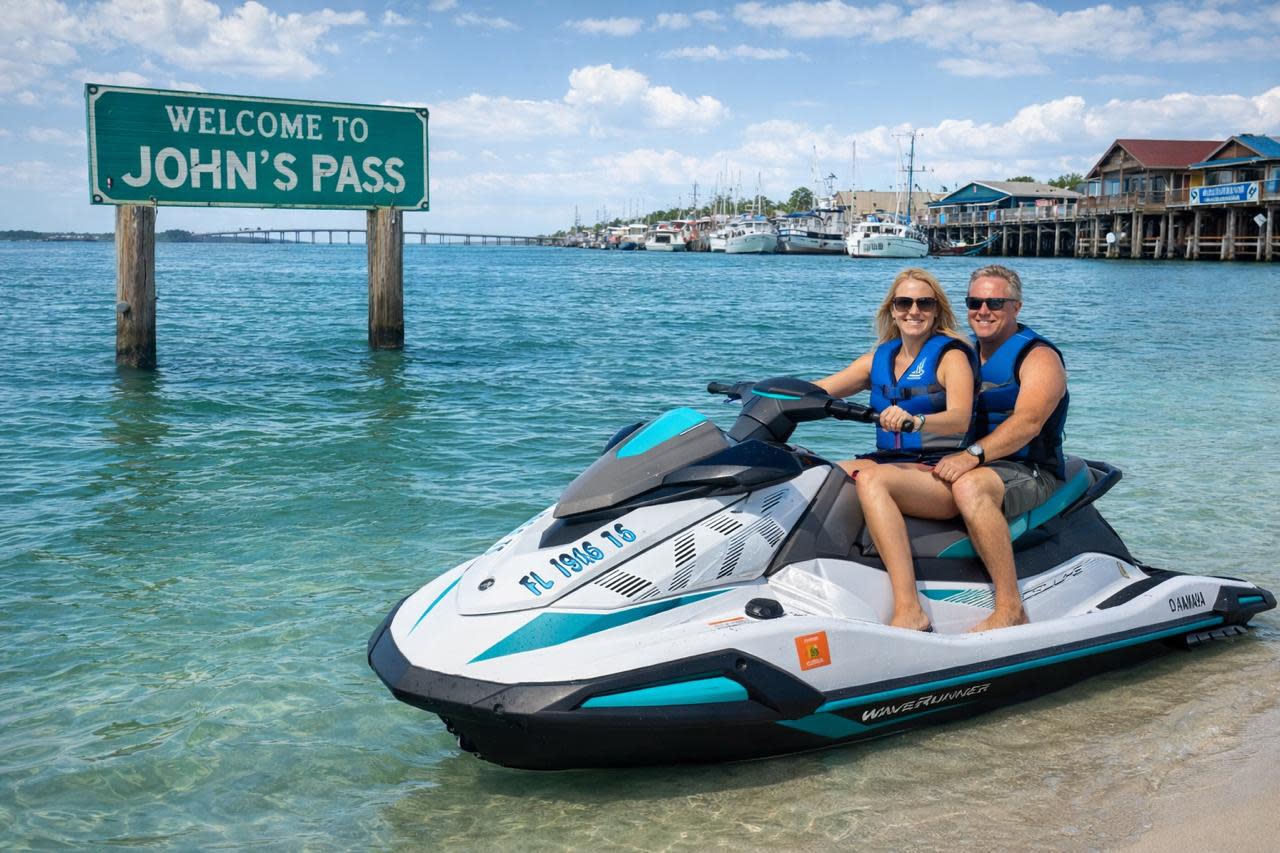 Couple stopping at the John’s Pass sandbar during a private guided jet ski tour
