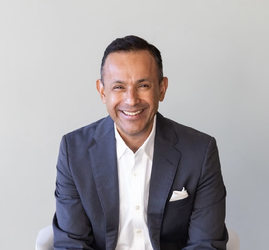 Javier Puga-Phillips, a gay real estate broker serving Portland, Oregon.