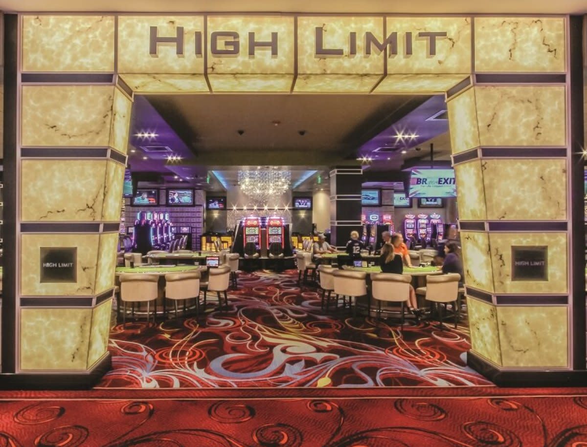 High Limit gaming room - marble entrance to VIP casino area with gaming tables inside.