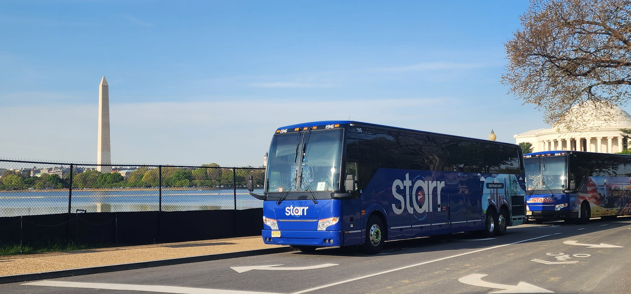 Starr Motorcoaches in Washington, DC Posing with the Washington Monument in the Background