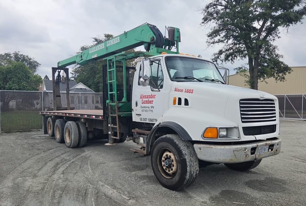 2000 Sterling pallet fork boom truck, front passenger-side view