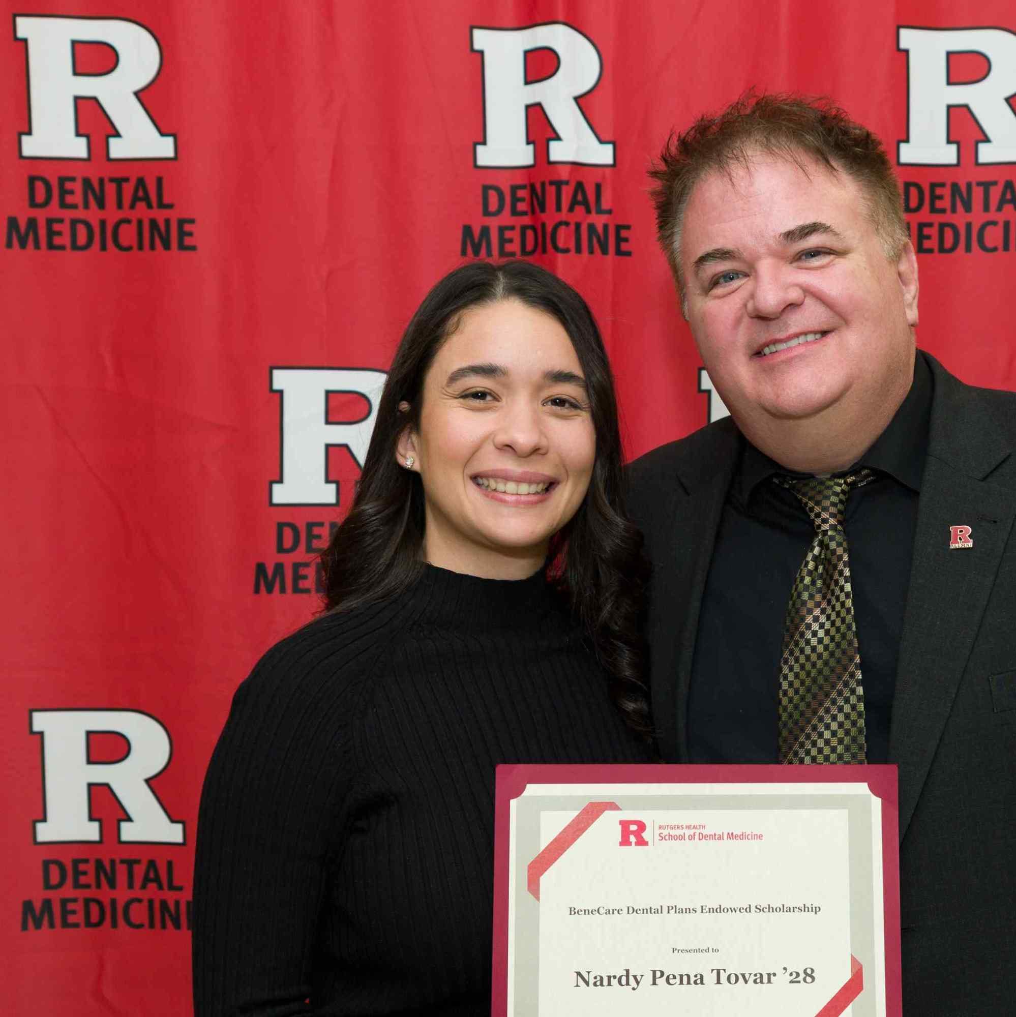 Nardy Peña Tovar, BeneCare Scholarship Recipient & Dr. Don Lapine, President, RSDM Alumni Association, Assistant Professor, Director of Operative Dentistry.
