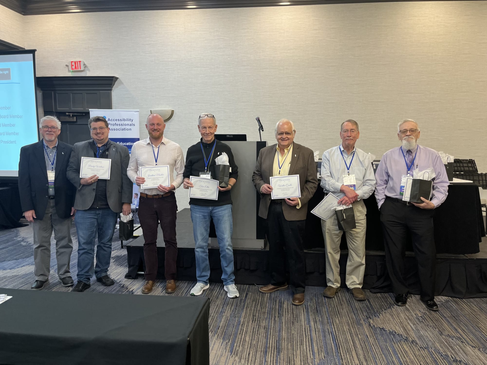 The 2025 APA Board members standing side by side