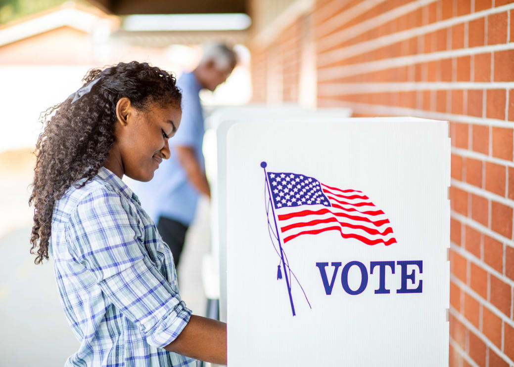 photo of woman voting
