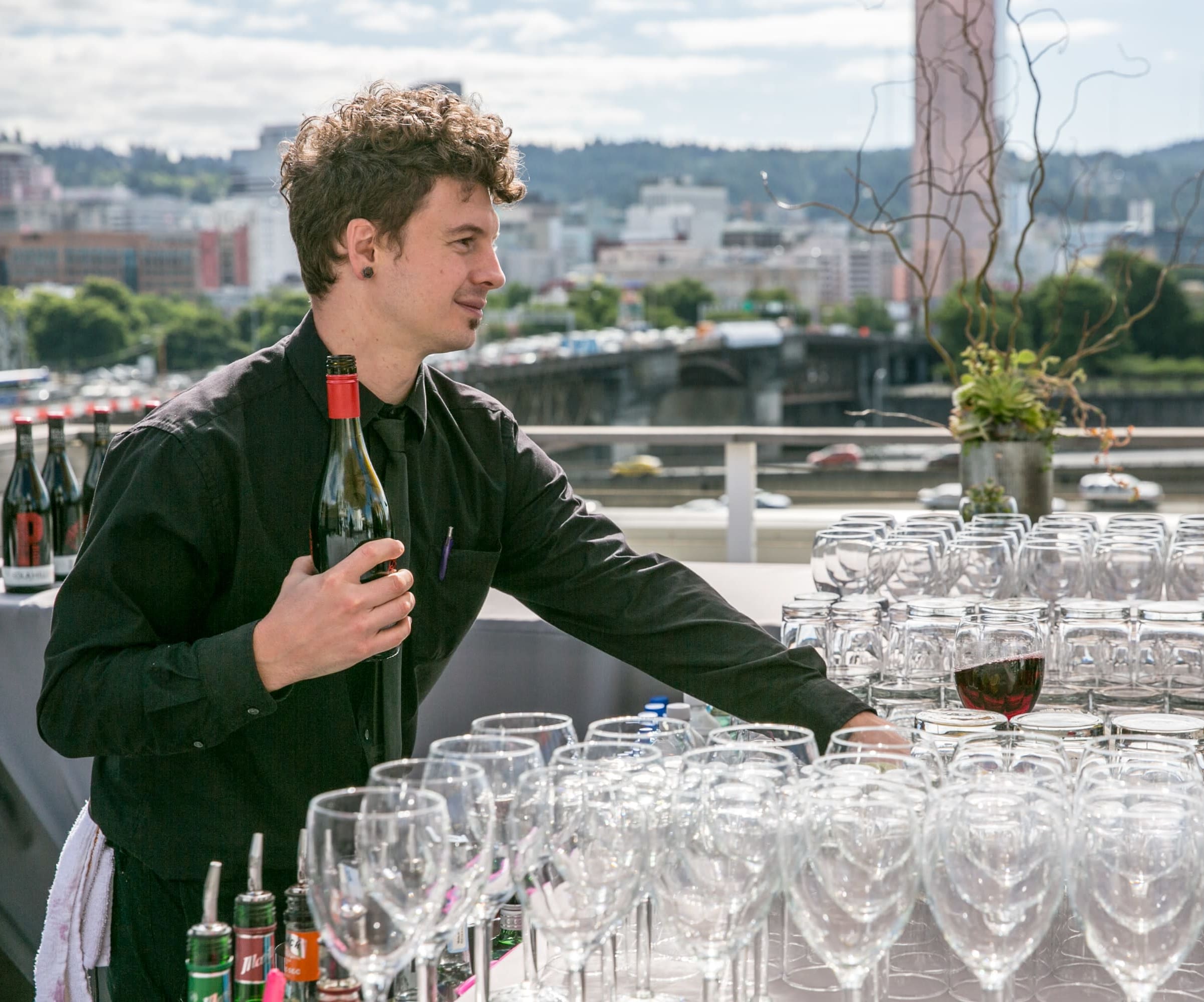Bartender serving wine