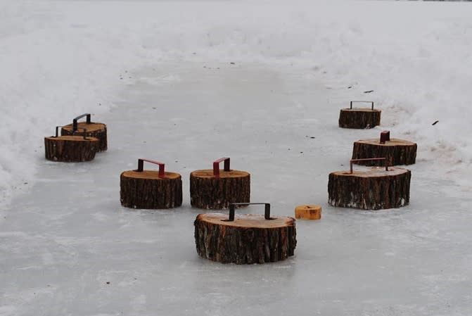 Ice Bocce Pucks and Pick