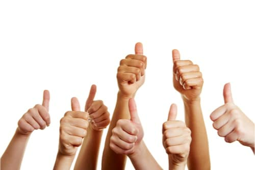 Group of hands with thumbs up