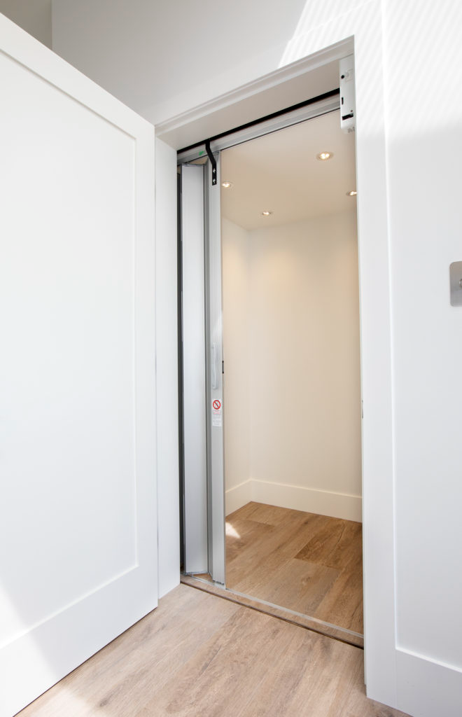 Elevator in Linda Vista Net Zero Home by Hasler Homes Ltd.