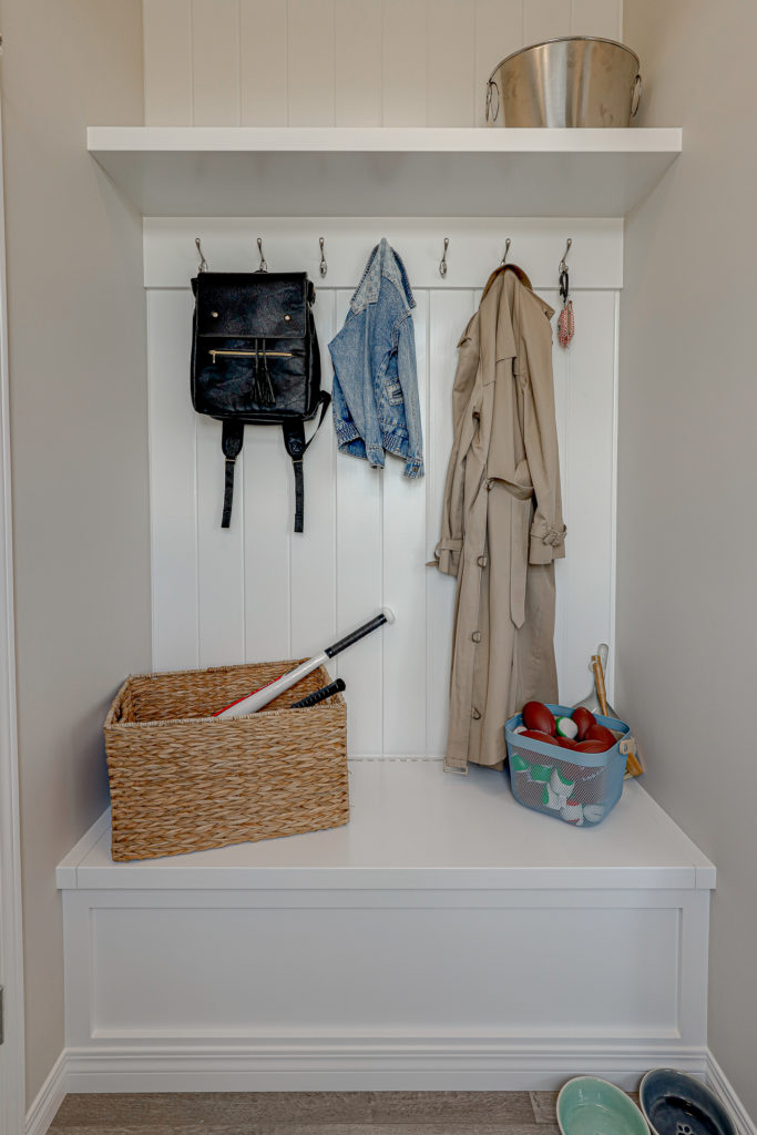 Foyer storage area in home by Homes by Dream
