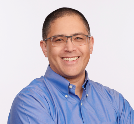 A person wearing glasses and a blue shirt

AI-generated content may be incorrect.