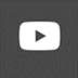A white play button with a black background

Description automatically generated