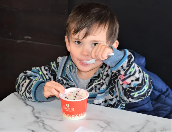 William Gerber, 4, enjoys an ice cream date with his mom at Miller