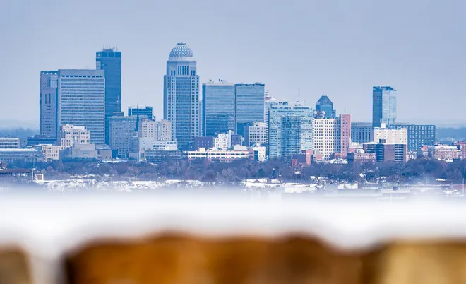 A cold Louisville skyline is seen from the Iroquois Park overlook after more winter weather blanketed the area on Wednesday morning. Feb. 19, 2025.