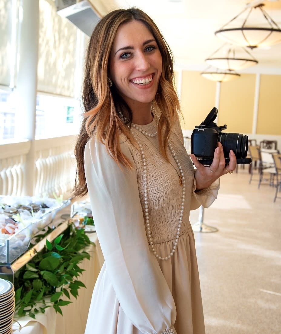 A person holding a camera 
AI-generated content may be incorrect., Picture