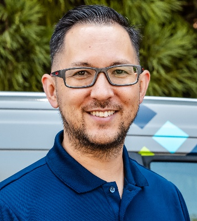 A person wearing glasses and smiling 
AI-generated content may be incorrect., Picture