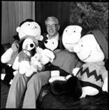 A person sitting in a chair with a group of stuffed animals

AI-generated content may be incorrect.