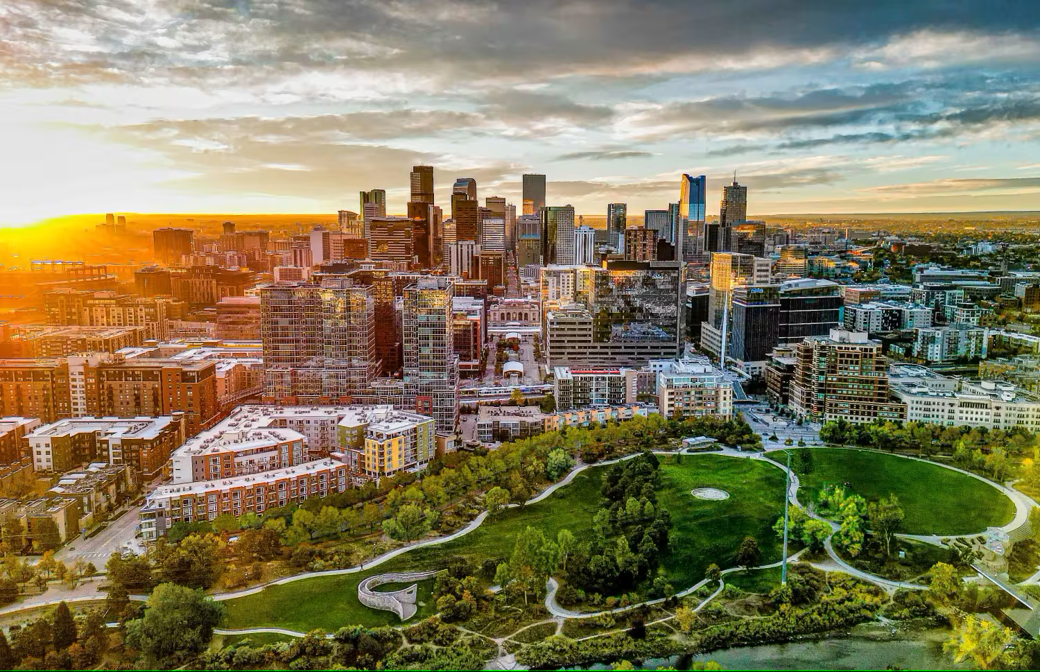 Drone photo of downtown Denver at sunrise, cityscape, Credit: Captain Colorado Photography