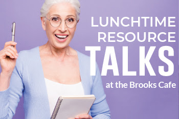 purple background woman with gray hair holding clip board and pencil