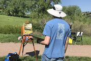 Painter attending an Open Space Plein Air series event