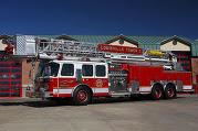Louisville Fire District ladder truck in front of fire station