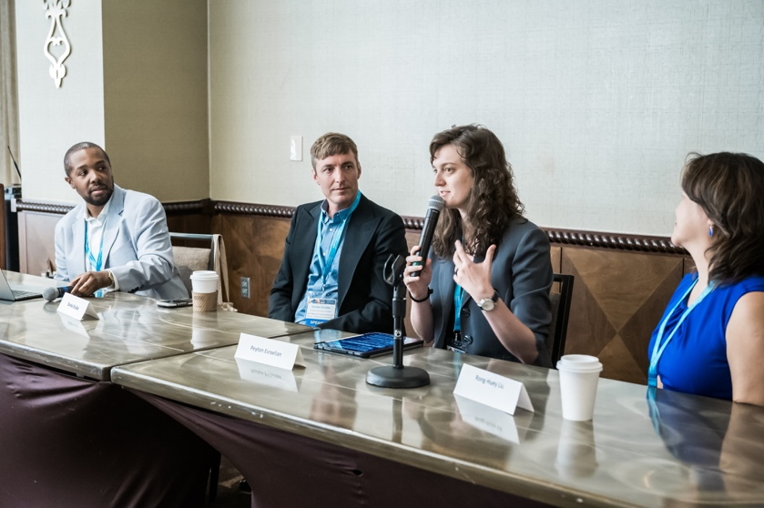 A group of people sitting at a table
AI-generated content may be incorrect.