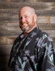 A person in a hawaiian shirt
AI-generated content may be incorrect.