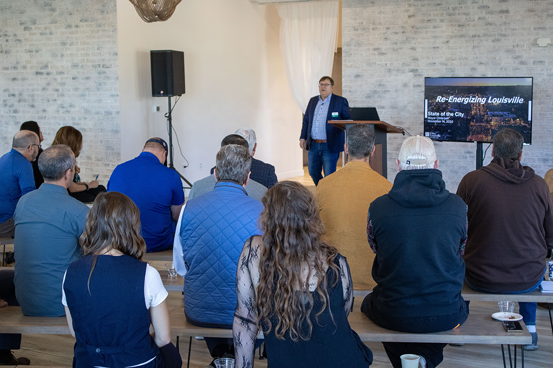 Louisville Mayor Chris Leh giving the State of the City address to a crowd in 2024