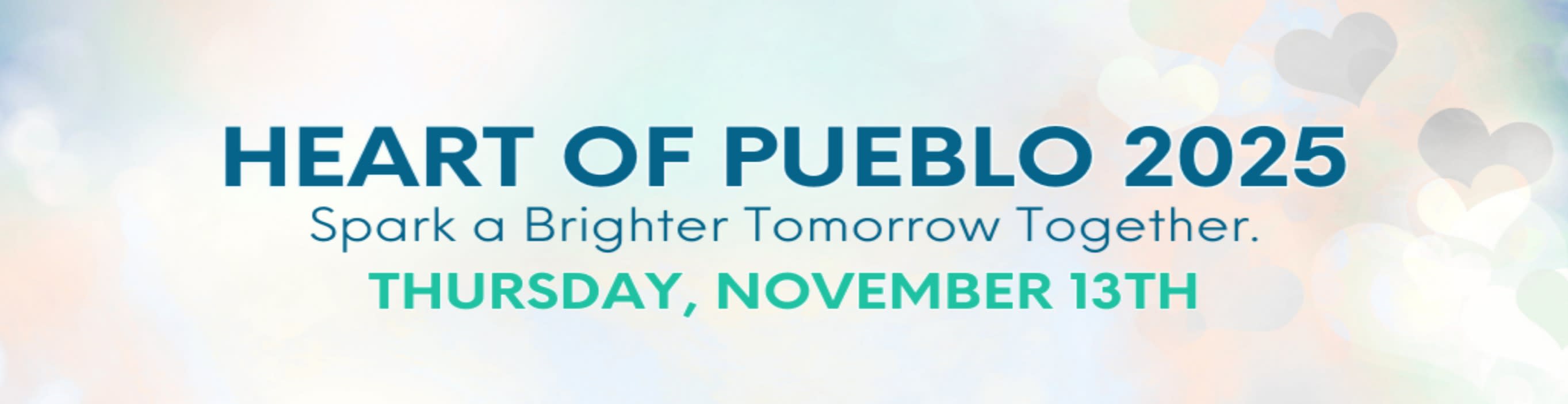 the heart of pueblo 25th anniversary logo with a background of white hearts