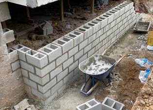 A wheelbarrow next to a wall

AI-generated content may be incorrect.