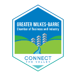 A hexagon shaped logo with buildings and a river 
AI-generated content may be incorrect.