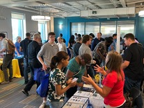 Crowds of job seekers and employers standing in a large room at Minneapolis Job and Resource Fair 9-25-25