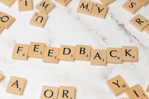 Scrabble tiles arranged to read feedback