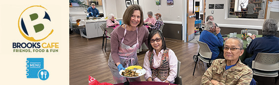seniors sitting together and eating lunch
