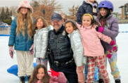 police officer and kids on skates