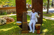 Zimbabwean musician Blessing Bled Chimanga with marimba and drums