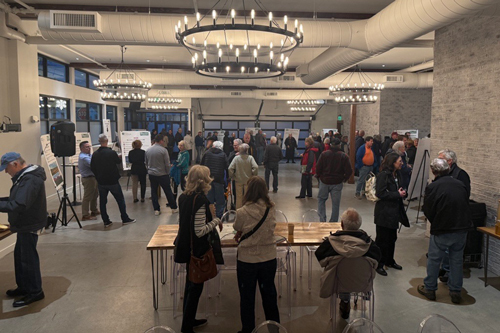 Crowd of people milling about at the Comp Plan Open House held Jan. 28 at The Simon in Louisville