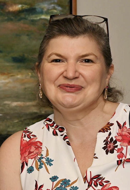 A person smiling at camera 
AI-generated content may be incorrect.